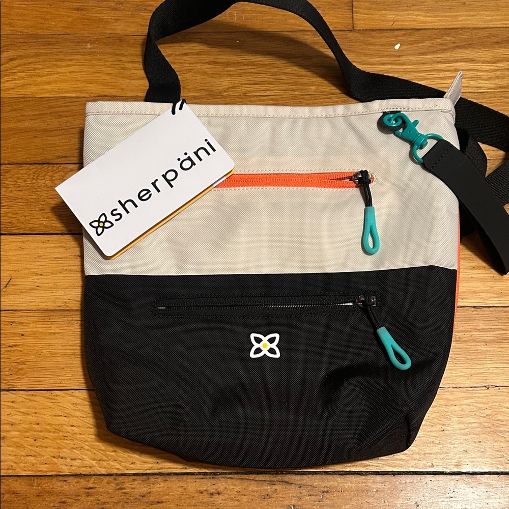 Sherpani Black and Cream Women’s Crossbody Bag RFID Card Guard NWT